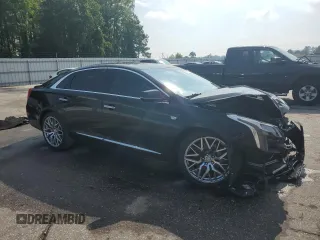 2018 Cadillac XTS Luxury with VIN 2G61N5S30J9164322, listed as a Copart auction lot 57048835 with 122,301 mi miles and Salvage title. Bid and sale history available at DreamBid. Image 4.