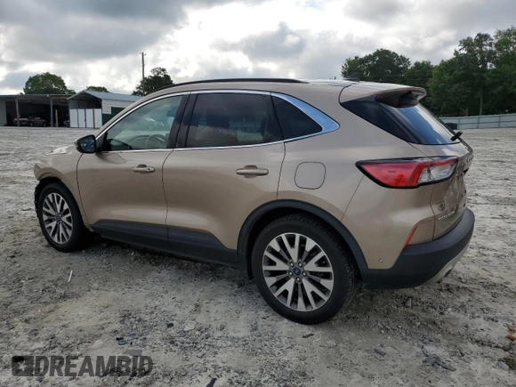 2020 Ford Escape Titanium Hybrid with VIN 1FMCU0DZ0LUC18460, listed as a Copart auction lot 57671085 with 97,587 mi miles and Salvage title. Bid and sale history available at DreamBid. Image 2.