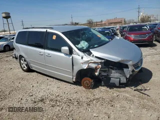 2011 Volkswagen Routan SE with VIN 2V4RW3DG0BR621820, listed as a Copart auction lot 87670825 with 180,222 mi miles and Salvage title. Bid and sale history available at DreamBid. Image 4.