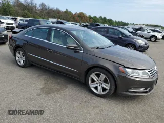 2014 Volkswagen CC R-Line with VIN WVWBP7AN9EE538276, listed as a Copart auction lot 64852674 with 143,474 mi miles and Salvage Title. Bid and sale history available at carsss.com. Image 4.