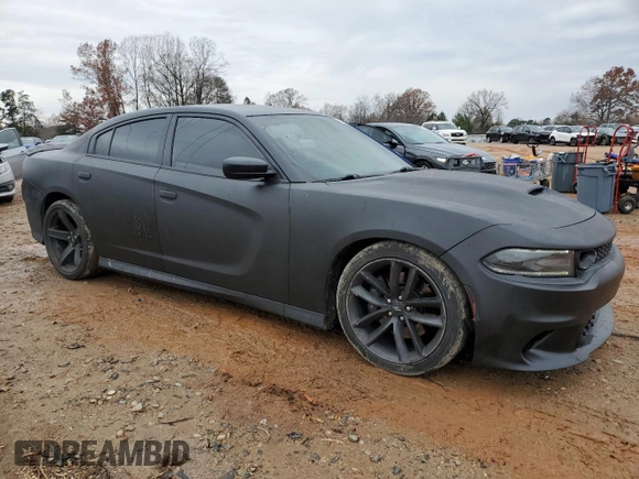 2019 Dodge Charger Scat Pack with VIN 2C3CDXGJ8KH638590, listed as a Copart auction lot 84241704 with 104,354 mi miles and Salvage Title. Bid and sale history available at DreamBid. Image 4.
