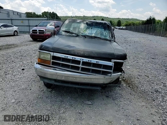 1995 Dodge Dakota z VIN 1B7GL23Y9SS385794, wystawiony jako Copart lot #63360094 z przebiegiem 394 435 mil mil oraz Szkoda całkowita • Salvage title. Historia ofert i sprzedaży dostępna na DreamBid. Obrazek 11.