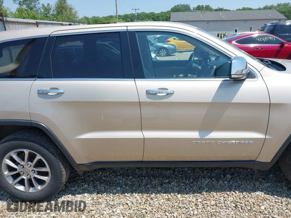 2014 Jeep Grand Cherokee Limited z VIN 1C4RJFBG9EC162684, wystawiony jako IAAI lot #42491647 z przebiegiem 152 328 mil mil oraz . Historia ofert i sprzedaży dostępna na DreamBid. Obrazek 13.