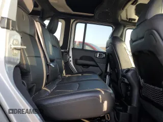 2024 Jeep Wrangler Sahara with VIN 1C4RJXP60RW128448, listed as a Copart auction lot 48658135 with 5,879 mi miles and Salvage Title. Bid and sale history available at DreamBid. Image 11.
