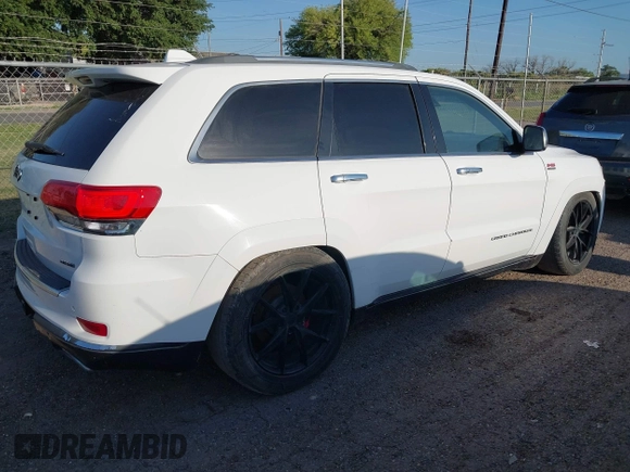 2015 Jeep Grand Cherokee Summit with VIN 1C4RJFJT5FC767687, listed as a IAAI auction lot 42015878 with 1 mi miles. Bid and sale history available at carsss.com. Image 4.