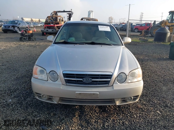 2004 Kia Optima LX z VIN KNAGD126045302372, wystawiony jako IAAI lot #41022315 z przebiegiem 199 588 mil mil oraz . Historia ofert i sprzedaży dostępna na DreamBid. Obrazek 13.