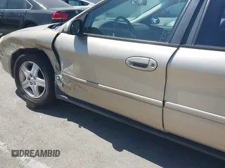 2000 Ford Taurus SEL with VIN 1FAFP56S3YA211717, listed as a IAAI auction lot 42249737 with 267,754 mi miles and . Bid and sale history available at DreamBid. Image 14.
