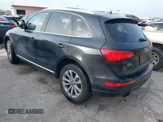 2014 Audi Q5 Premium Plus with VIN WA1LFAFP2EA094299, listed as a IAAI auction lot 41902914 with 131,422 mi miles. Bid and sale history available at carsss.com. Image 3.