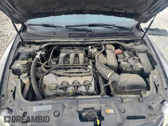 2011 Ford Taurus Limited z VIN 1FAHP2JW1BG156691, wystawiony jako Copart lot #59811755 z przebiegiem 162 828 mil mil oraz Szkoda całkowita • Salvage title. Historia ofert i sprzedaży dostępna na DreamBid. Obrazek 11.