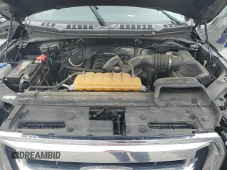2016 Ford F-150 XLT with VIN 1FTEW1EF4GKE98094, listed as a Copart auction lot 52121985 with 125,000 mi miles and Salvage Title. Bid and sale history available at DreamBid. Image 12.