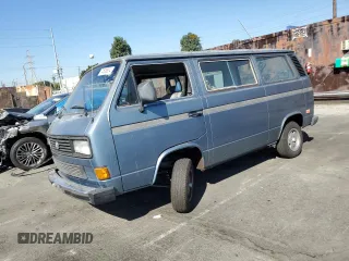 1986 Volkswagen Vanagon with VIN WV2YB0255GH082892, listed as a Copart auction lot 74600804 with 181,034 mi miles and Salvage Title. Bid and sale history available at DreamBid. Image 1.