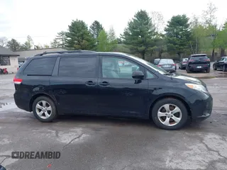 2014 Toyota Sienna LE AAS with VIN 5TDKK3DC0ES487830, listed as a IAAI auction lot 42216342 with 155,973 mi miles and . Bid and sale history available at carsss.com. Image 13.