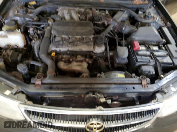 1999 Toyota Solara SE z VIN 2T1CF22P5XC230117, wystawiony jako Copart lot #57488925 z przebiegiem 282 366 mil mil oraz Czysty tytuł • Clean title. Historia ofert i sprzedaży dostępna na DreamBid. Obrazek 11.