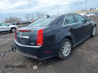 2011 Cadillac CTS z VIN 1G6DC5EY9B0153096, wystawiony jako IAAI lot #42146595 z przebiegiem 148 990 mil mil oraz . Historia ofert i sprzedaży dostępna na DreamBid. Obrazek 4.