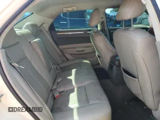 2009 Chrysler 300 Touring with VIN 2C3LA53V69H553621, listed as a Copart auction lot 70569634 with 141,157 mi miles and Salvage Title. Bid and sale history available at carsss.com. Image 10.
