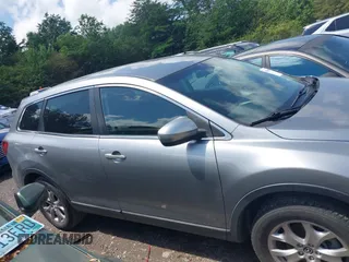 2015 Mazda CX-9 Touring with VIN JM3TB2CA2F0451180, listed as a IAAI auction lot 42180078 with 112,804 mi miles and . Bid and sale history available at carsss.com. Image 13.