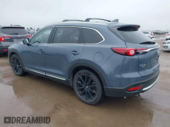 2021 Mazda CX-9 Grand Touring with VIN JM3TCBDY9M0534966, listed as a IAAI auction lot 42166071 with 77,817 mi miles and . Bid and sale history available at DreamBid. Image 3.