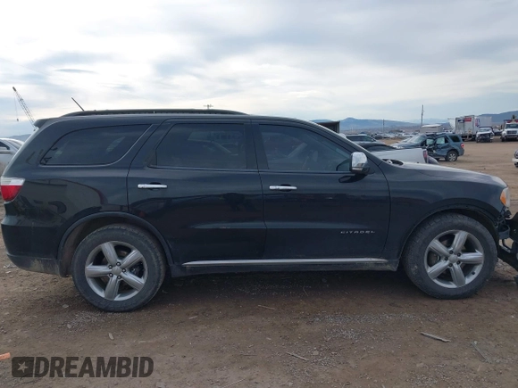 2011 Dodge Durango Citadel with VIN 1D4SE5GT0BC648692, listed as a IAAI auction lot 41892955 with 197,798 mi miles and . Bid and sale history available at DreamBid. Image 14.