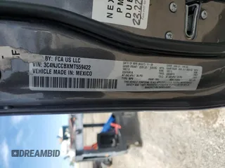 2021 Jeep Compass Limited with VIN 3C4NJCCBXMT559422, listed as a Copart auction lot 56952545 with 135,697 mi miles and Salvage title. Bid and sale history available at DreamBid. Image 14.