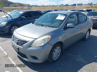 2014 Nissan Versa SV with VIN 3N1CN7AP9EL834221, listed as a IAAI auction lot 42161427 with 227,391 mi miles. Bid and sale history available at carsss.com. Image 2.
