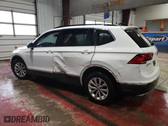 2018 Volkswagen Tiguan SEL with VIN 3VV2B7AX9JM065985, listed as a Copart auction lot 79404694 with Not provided miles and Salvage title. Bid and sale history available at DreamBid. Image 2.
