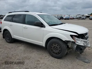 2014 Dodge Journey SE with VIN 3C4PDCAB7ET240936, listed as a Copart auction lot 55115645 with 242,155 mi miles and Salvage title. Bid and sale history available at DreamBid. Image 4.