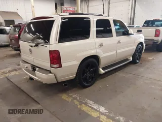 2003 Cadillac Escalade z VIN 1GYEK63N53R162632, wystawiony jako IAAI lot #41542627 z przebiegiem 147 577 mil mil oraz . Historia ofert i sprzedaży dostępna na DreamBid. Obrazek 4.