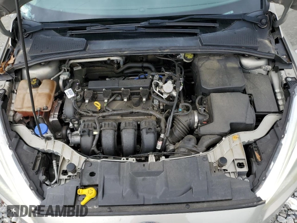 2016 Ford Focus SE z VIN 1FADP3F2XGL341167, wystawiony jako Copart lot #59042435 z przebiegiem 71 345 mil mil oraz Szkoda całkowita • Salvage title. Historia ofert i sprzedaży dostępna na DreamBid. Obrazek 11.