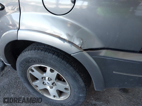 2003 Ford Escape Limited с VIN 1FMCU04183KA03950, выставлен на аукционе IAAI как лот 42143032 с пробегом 198 189 миль миль и . История ставок и продаж доступна на DreamBid. Изображение 6.