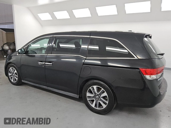 2015 Honda Odyssey Touring Elite with VIN 5FNRL5H95FB017434, listed as a Copart auction lot 55011035 with 111,254 mi miles and Clean title. Bid and sale history available at DreamBid. Image 2.