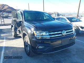 2019 Volkswagen Atlas SE with VIN 1V2LR2CAXKC566024, listed as a IAAI auction lot 41296531 with 106,175 mi miles and . Bid and sale history available at DreamBid. Image 1.
