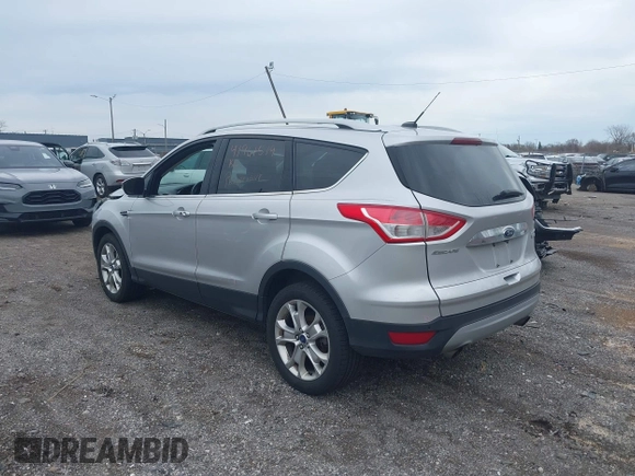 2016 Ford Escape Titanium with VIN 1FMCU9J93GUC55811, listed as a IAAI auction lot 41961519 with 99,878 mi miles. Bid and sale history available at carsss.com. Image 3.