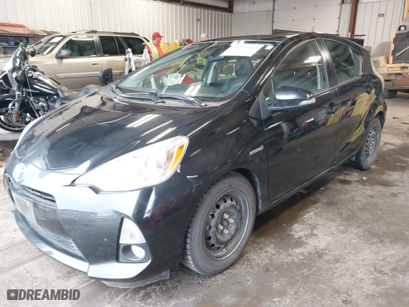 2012 Toyota Prius c One with VIN JTDKDTB39C1526082, listed as a IAAI auction lot 41619243 with 98,504 mi miles. Bid and sale history available at carsss.com. Image 18.