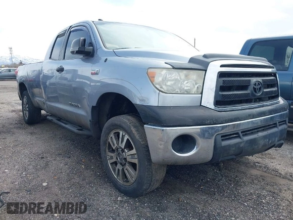 2012 Toyota Tundra 4WD Truck SR with VIN 5TFCW5F19CX012832, listed as a IAAI auction lot 41726453 with 232,078 mi miles. Bid and sale history available at carsss.com. Image 1.