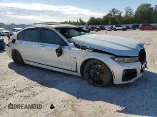 2022 BMW 7 Series with VIN WBA7W4C06NCJ99199, listed as a Copart auction lot 67928902 with Not provided miles and . Bid and sale history available at DreamBid. Image 4.