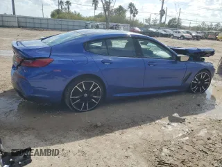 2023 BMW 8 Series M850i z VIN WBAGV8C08PCK41272, wystawiony jako Copart lot #77442574 z przebiegiem Nie podano mil oraz Szkoda całkowita • Salvage title. Historia ofert i sprzedaży dostępna na DreamBid. Obrazek 3.
