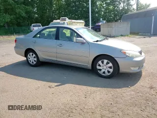 2005 Toyota Camry LE with VIN 4T1BE30K95U590370, listed as a Copart auction lot 63141505 with 238,510 mi miles and Salvage title. Bid and sale history available at DreamBid. Image 13.