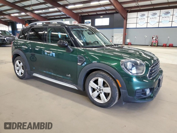 2018 MINI Countryman Cooper with VIN WMZYV5C38J3E03914, listed as a Copart auction lot 87455344 with 86,706 mi miles and Salvage Title. Bid and sale history available at carsss.com. Image 4.