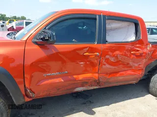 2017 Toyota Tacoma SR5 with VIN 5TFCZ5AN4HX091383, listed as a IAAI auction lot 42202505 with 82,000 mi miles and . Bid and sale history available at DreamBid. Image 6.