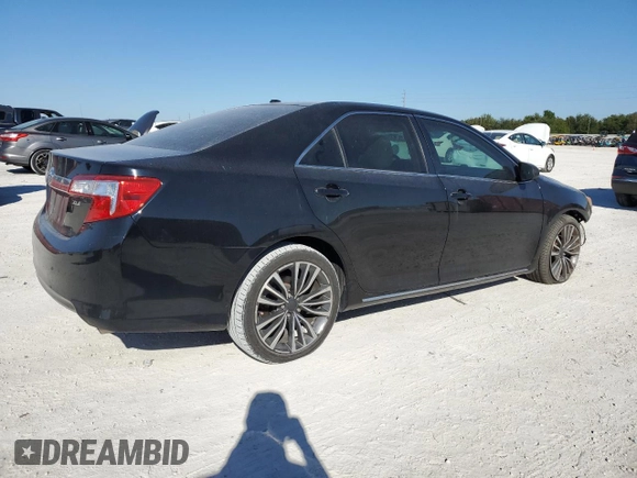 2014 Toyota Camry L with VIN 4T4BF1FK2ER376447, listed as a Copart auction lot 82886974 with 112,833 mi miles and Salvage Title. Bid and sale history available at DreamBid. Image 3.