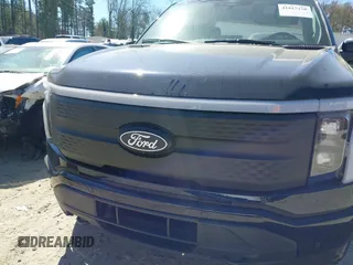 2024 Ford F-150 Lightning Flash with VIN 1FT6W3L75RWG30755, listed as a IAAI auction lot 41817158 with 1,932 mi miles and . Bid and sale history available at DreamBid. Image 12.
