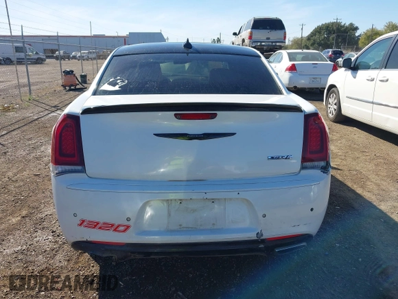 2012 Chrysler 300 SRT-8 with VIN 2C3CCAFJ9CH801749, listed as a IAAI auction lot 40912606 with 144,404 mi miles and . Bid and sale history available at DreamBid. Image 17.