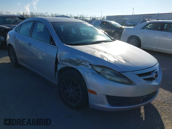 2012 Mazda 6 i Sport with VIN 1YVHZ8BH6C5M26710, listed as a IAAI auction lot 41593399 with 198,857 mi miles and . Bid and sale history available at DreamBid. Image 1.