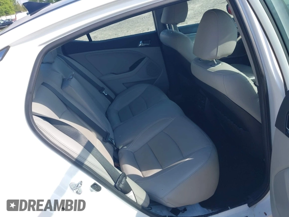 2013 Kia Optima EX with VIN 5XXGN4A79DG105157, listed as a IAAI auction lot 42496945 with 119,000 mi miles and . Bid and sale history available at DreamBid. Image 8.