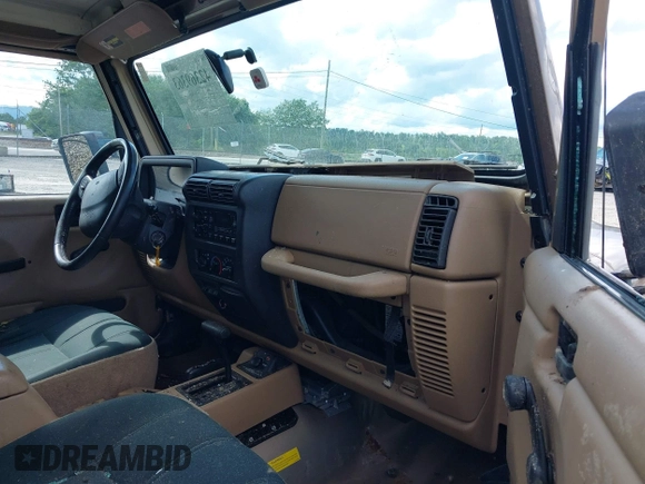 1999 Jeep Wrangler Sahara with VIN 1J4FY49S3XP407594, listed as a IAAI auction lot 42369363 with 253,780 mi miles and . Bid and sale history available at DreamBid. Image 5.