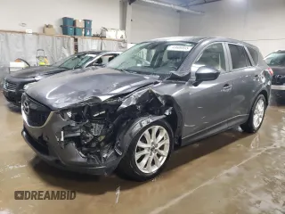 2014 Mazda CX-5 Grand Touring with VIN JM3KE4DY2E0370754, listed as a Copart auction lot 43606955 with 91,074 mi miles and Salvage Title. Bid and sale history available at carsss.com. Image 1.