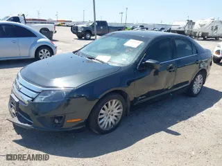 2010 Ford Fusion Hybrid with VIN 3FADP0L32AR371980, listed as a IAAI auction lot 42020330 with 272,984 mi miles. Bid and sale history available at carsss.com. Image 2.