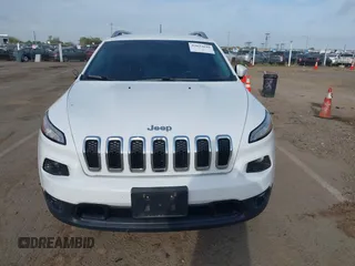 2016 Jeep Cherokee Latitude with VIN 1C4PJMCS1GW185442, listed as a IAAI auction lot 42033699 with 123,306 mi miles. Bid and sale history available at carsss.com. Image 12.