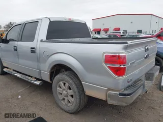2013 Ford F-150 XL with VIN 1FTEW1CM9DKE10279, listed as a IAAI auction lot 41315691 with 148,668 mi miles. Bid and sale history available at carsss.com. Image 3.