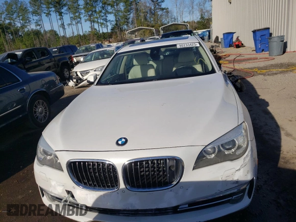 2013 BMW 7 Series 750i with VIN WBAYA8C55DC996693, listed as a Copart auction lot 80233423 with 140,925 mi miles and Salvage Title. Bid and sale history available at DreamBid. Image 5.